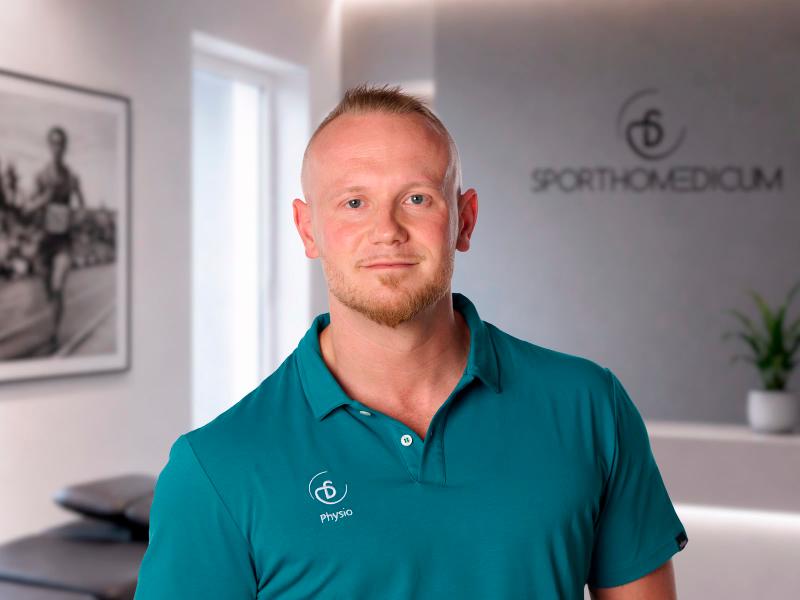 Porträtfoto von Alexander Spies, Physiotherapeut
